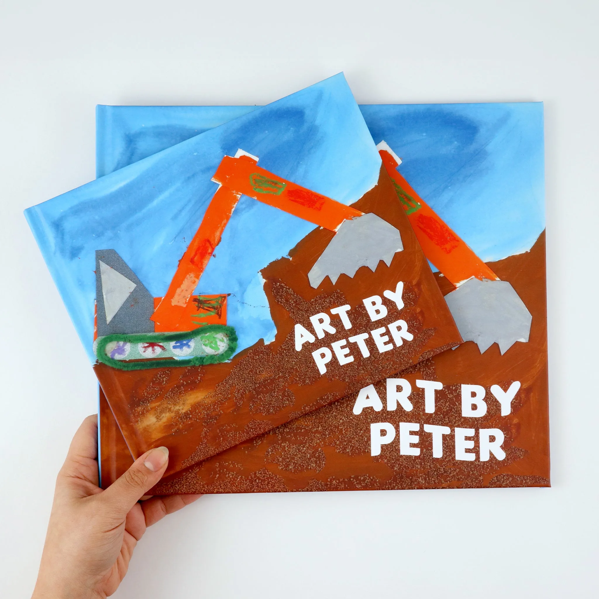 Plum Print hardcover art book, a bound children's artwork book from the Plum Print service