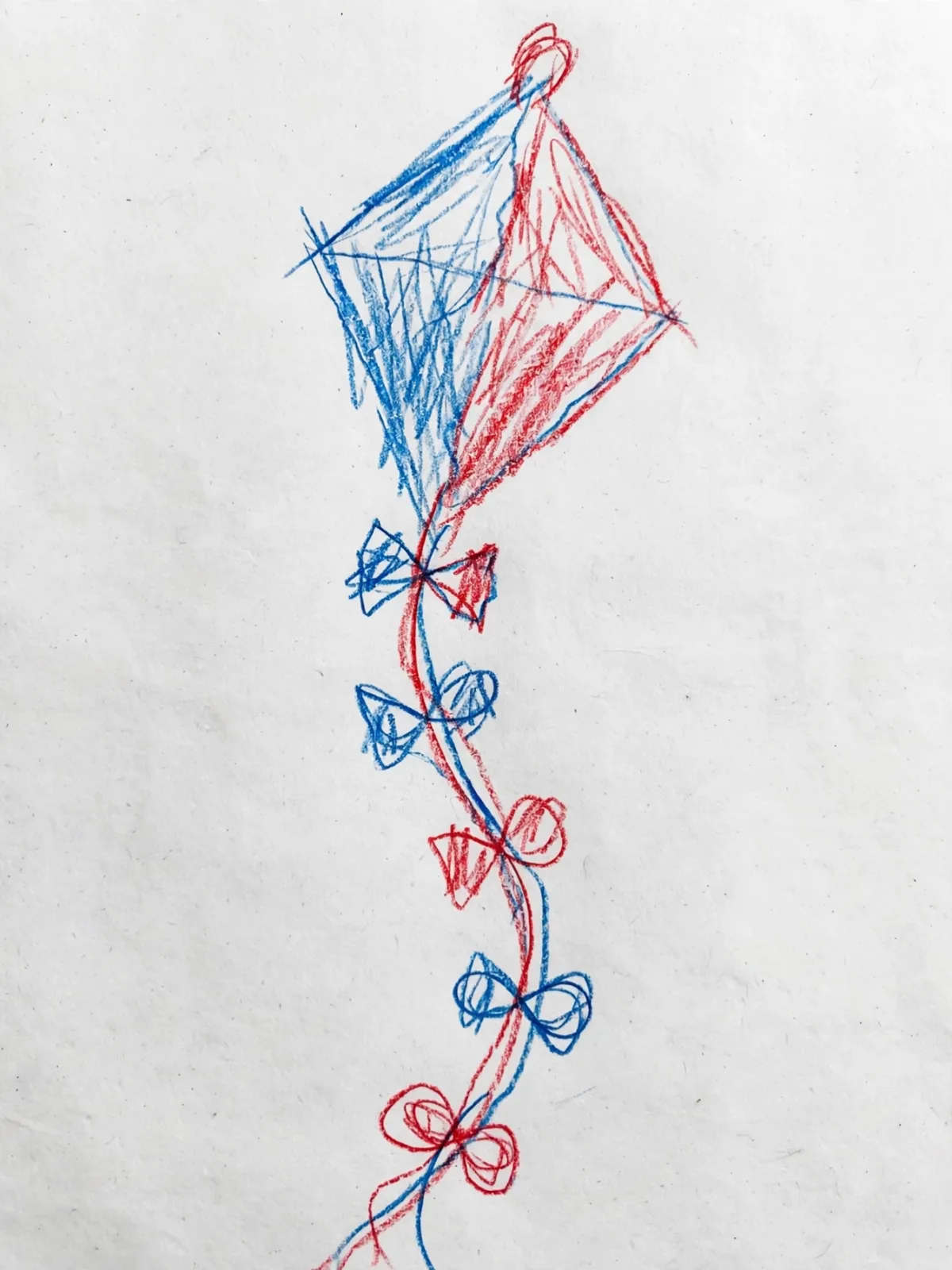Leo's colored pencil drawing of a kite with a bow tail, turned into the hero of his first day of school DoodleTale storybook
