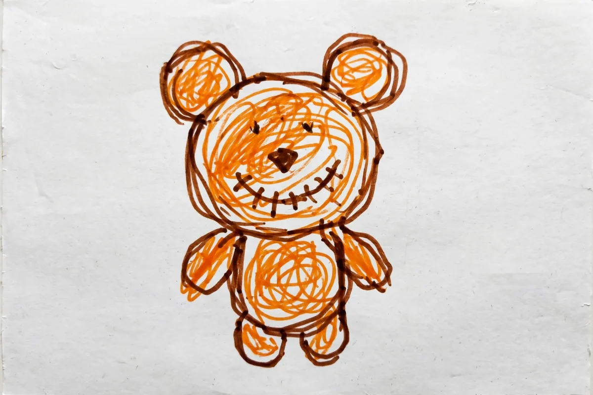 Omar's marker drawing of a teddy bear, turned into the hero of his first day of school DoodleTale storybook